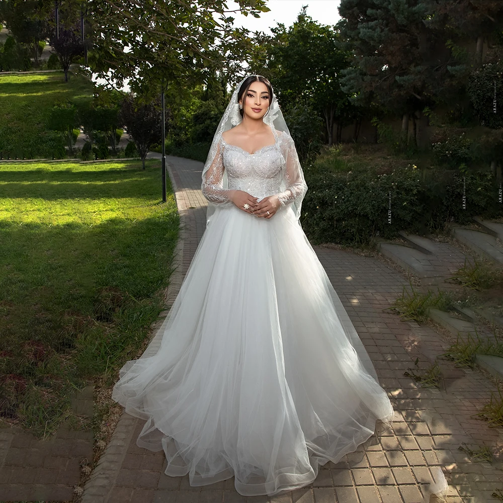 

Simple Wedding Dresses Sweetheart Illusion Long Sleeve A-Line Bride Dress Appliques Sequined Sweep Train Bridal Gown Customized