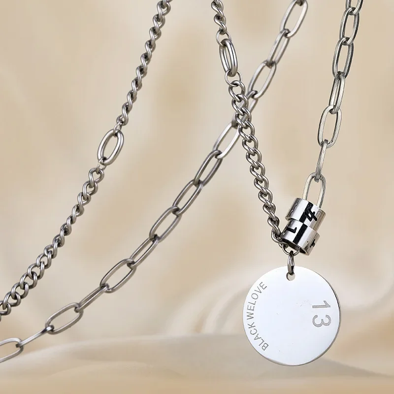 

A simple letter round plate 1314 spliced necklace, a cold style titanium steel short sweater chain for women