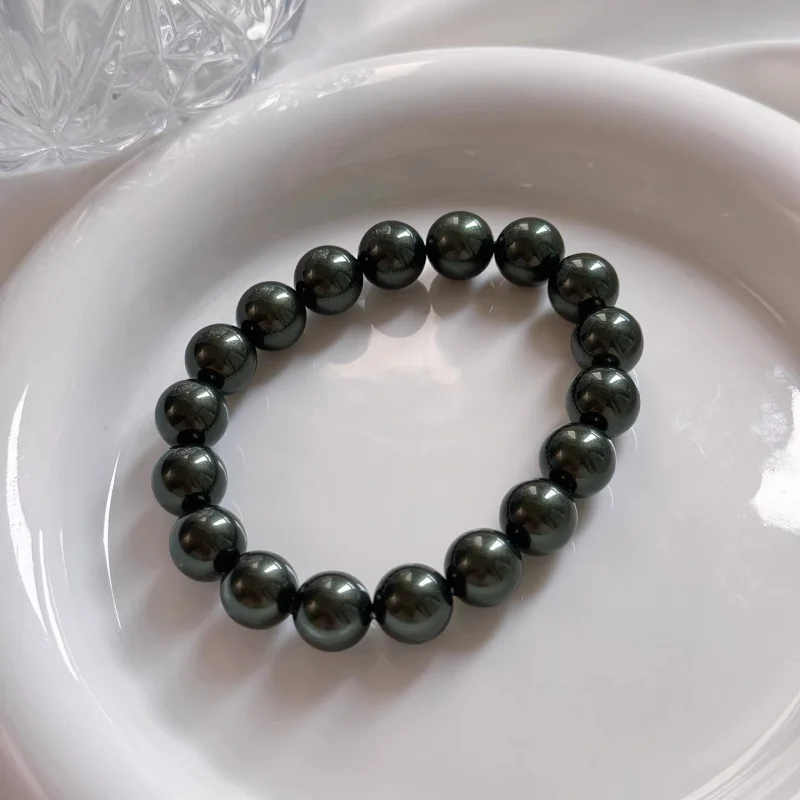 

Tahitian Peacock Green Pearl Bracelet for Women 2026 New Popular Model Light Luxury Niche Elastic Cord with High-End Design