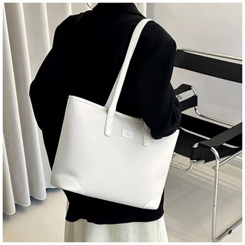 

Elegant Women's Tote Bag Made Of Premium Leather Boasting Famous Designer Inspired And Trendy Timeless Look ​