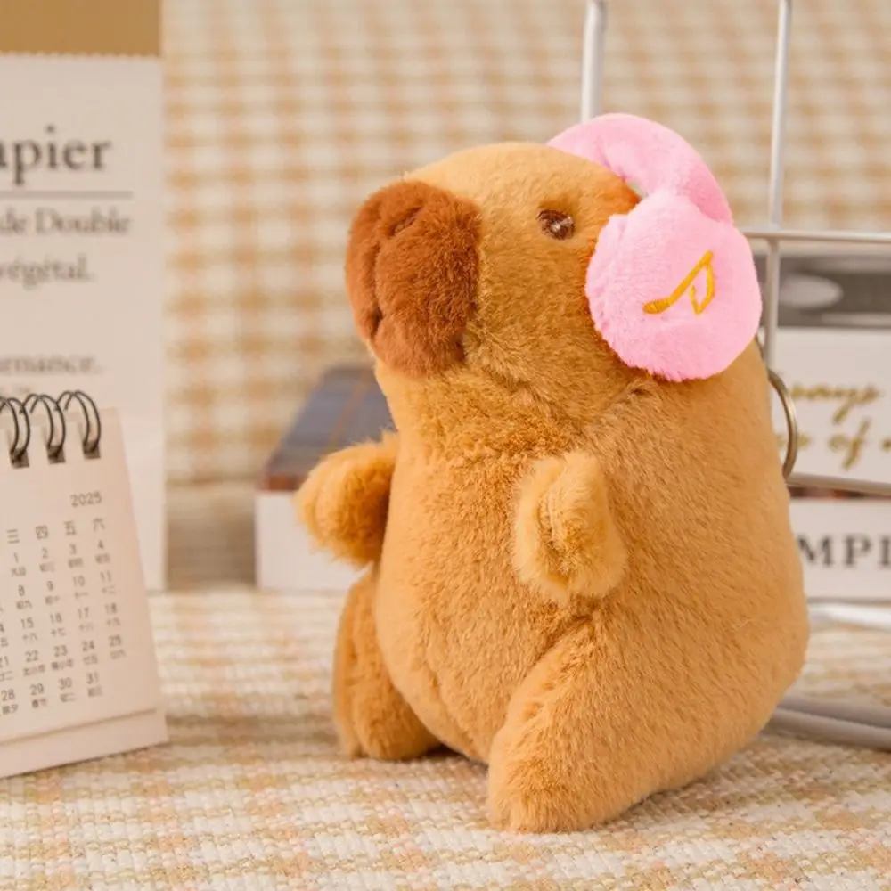 Porte-clés de poupée Capybara en peluche polyvalent, multicolore, portant des écouteurs, pendentif Capybara, sac de jouet