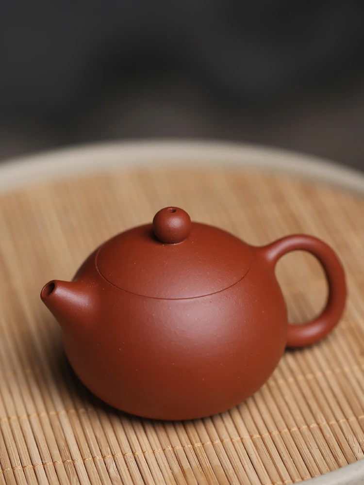 

Yixing Xiaohongni Kung Fu Gongfu Tea Pouring Handle Xishi Pot Raw Ore Ball Hole Filtering Small Household