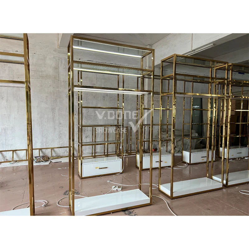 Customized-fashion boutique store layout hanging garment display rack Golden clothes display stand women clothing store furn