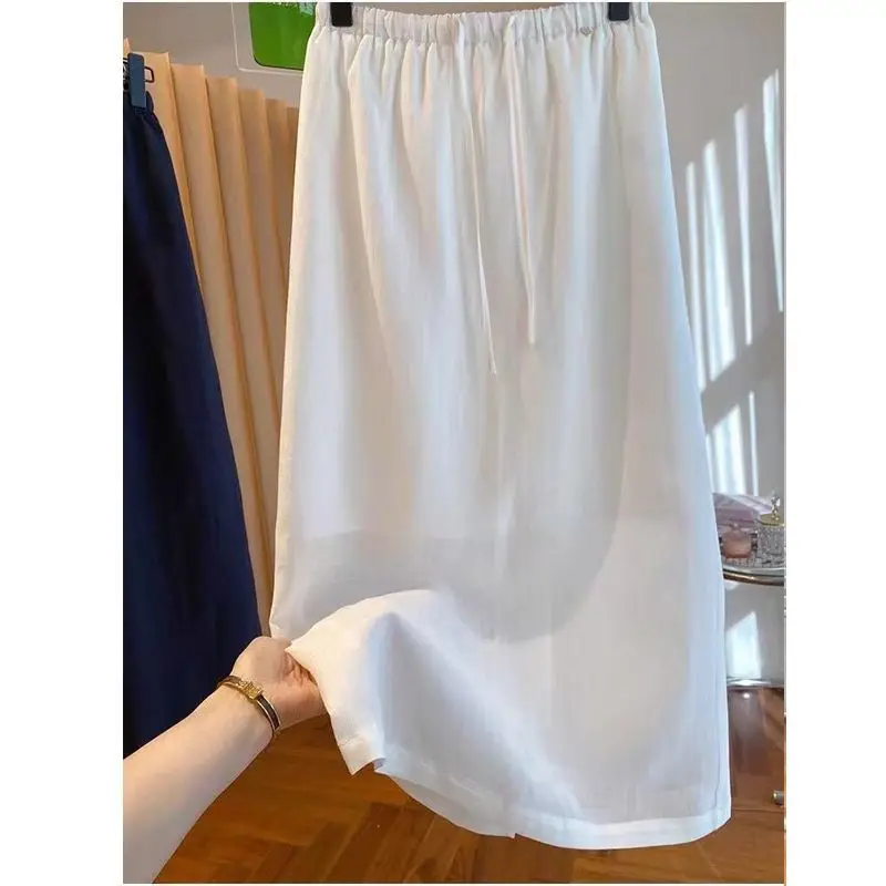 

Высококачественная юбка с цветным эластичным дизайном с высокой талией, летняя затягивающая талию и шнуровкой, новая свободная длинная юбка для женщин