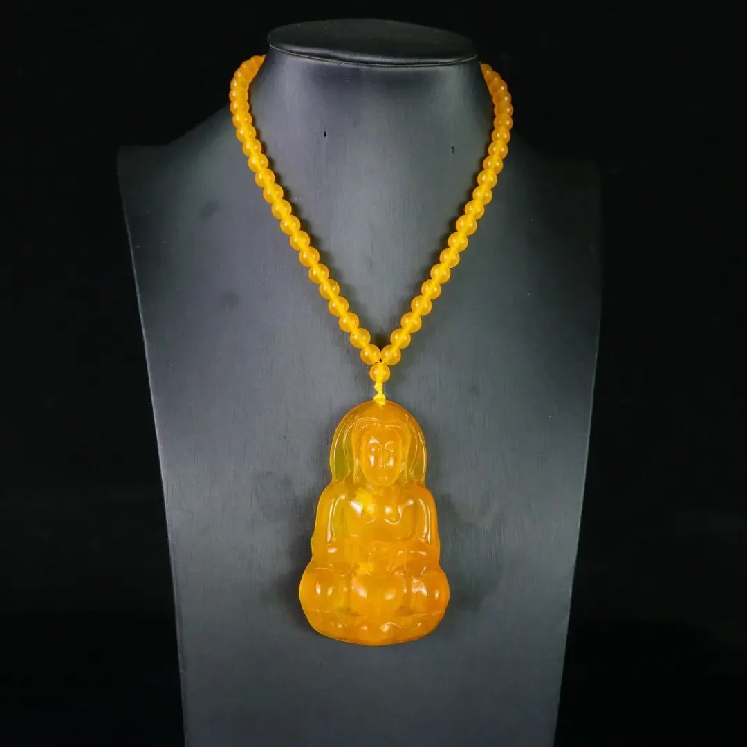 

Popular jadeite Guanyin pendant, Laokeng ice type yellow jade large Guanyin jade pendant, men's model.