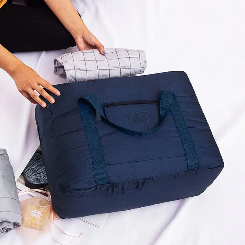 Bolsa de viaje plegable de alta capacidad para hombres y mujeres, bolsa de lona impermeable de nailon, organizador de ropa de mano, almacenamiento