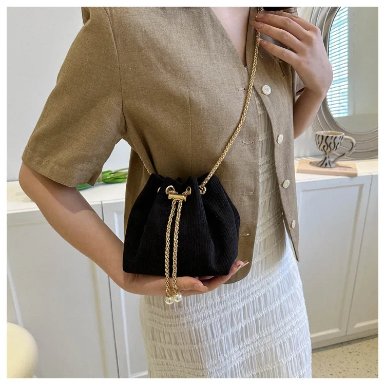 

IN STOCK Miyake fold Fashionable one shoulder simple diagonal cross lamp core velvet Western style water bucket bag HOT SELLING