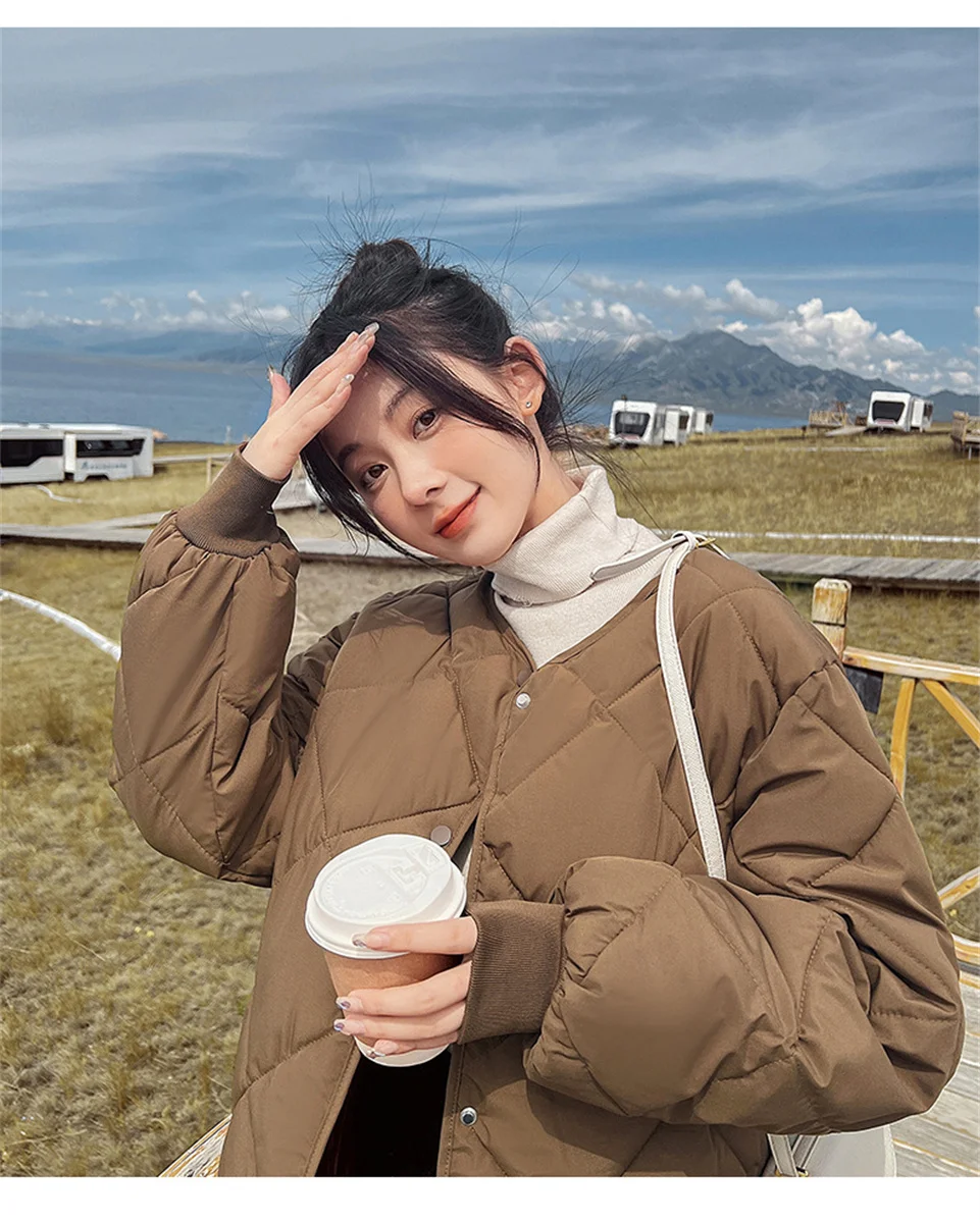 معطف فضفاض من القطن بسحاب للنساء خفيف الوزن للخريف والشتاء ملابس خارجية دافئة موضة كورية سترة بيسبول جديدة للنساء 2026