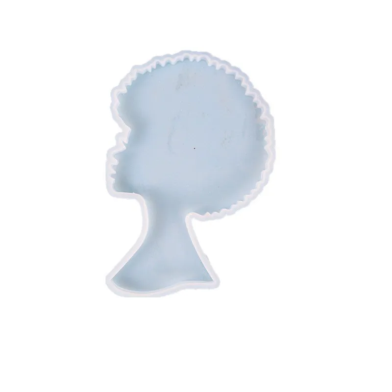 A silicone mold made of epoxy resin for women's avatars which can be used for storing coasters trays and ornaments