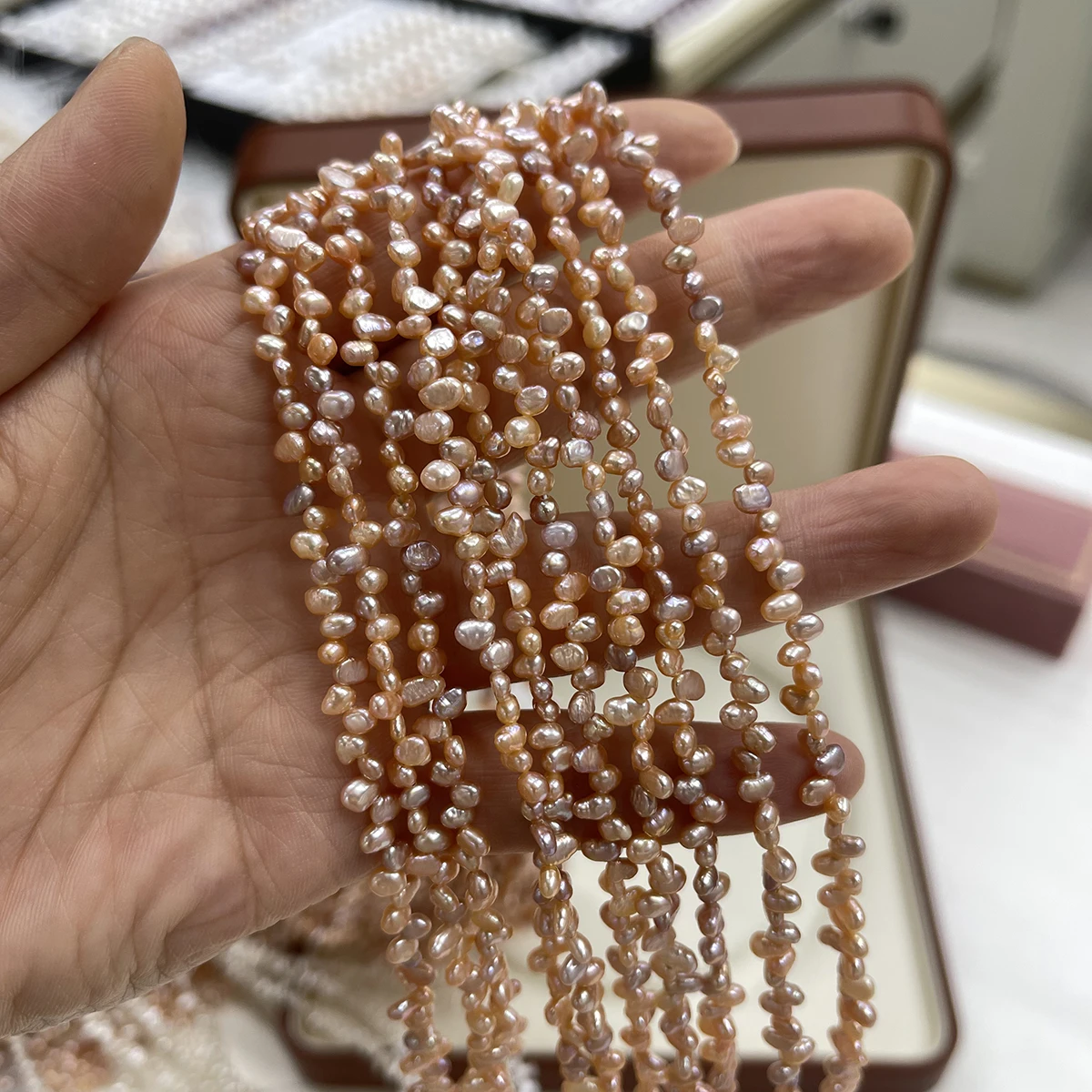 

Factory Wholesale 4-5mm Orange Flat Rice-grain Natural Freshwater Pearl Bead Loose Bead for DIY Necklace Bracelet Jewelry Making