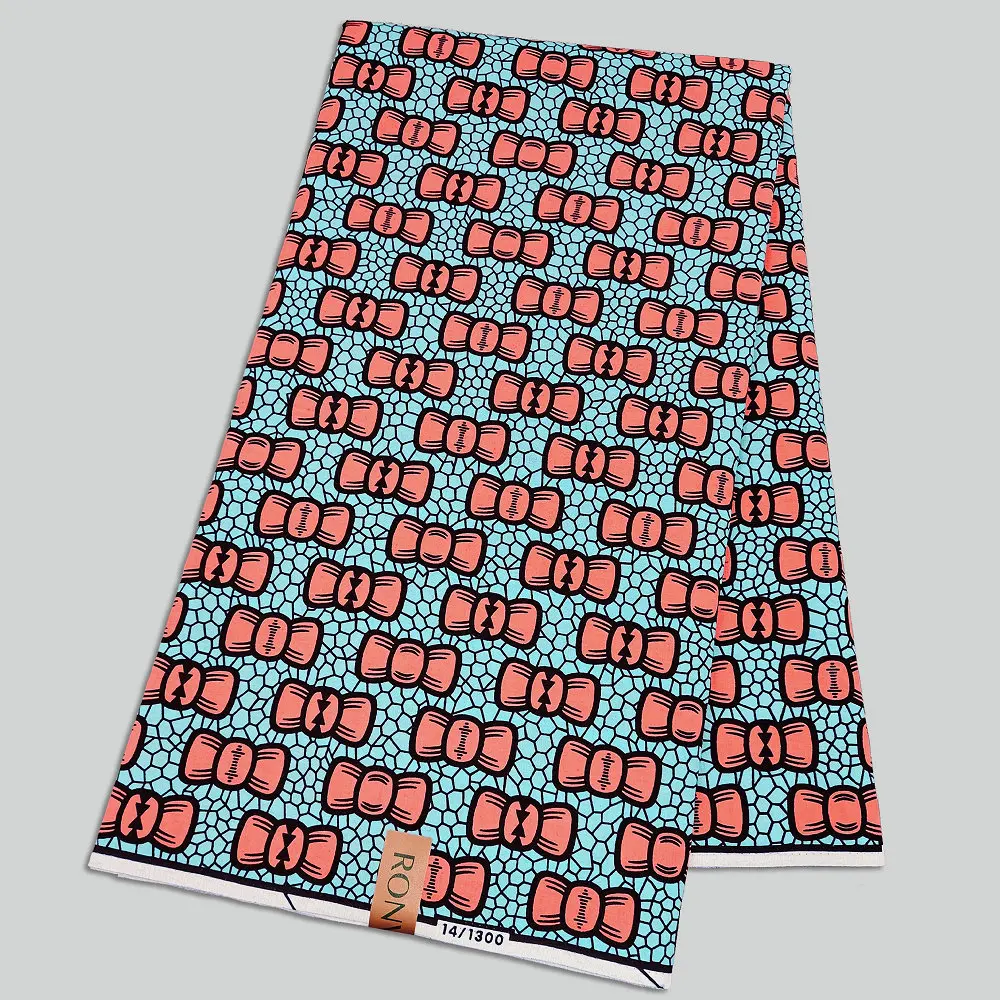 Tkanina Ankara z motywem świątecznym, wzór kokardek, drukowana na wosku Hollandais, do dekoracji wnętrz i rękodzieła.