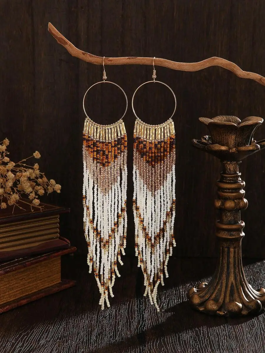 

Серьги-кольца ручной работы с бисером и бахромой, в стиле бохо-шик