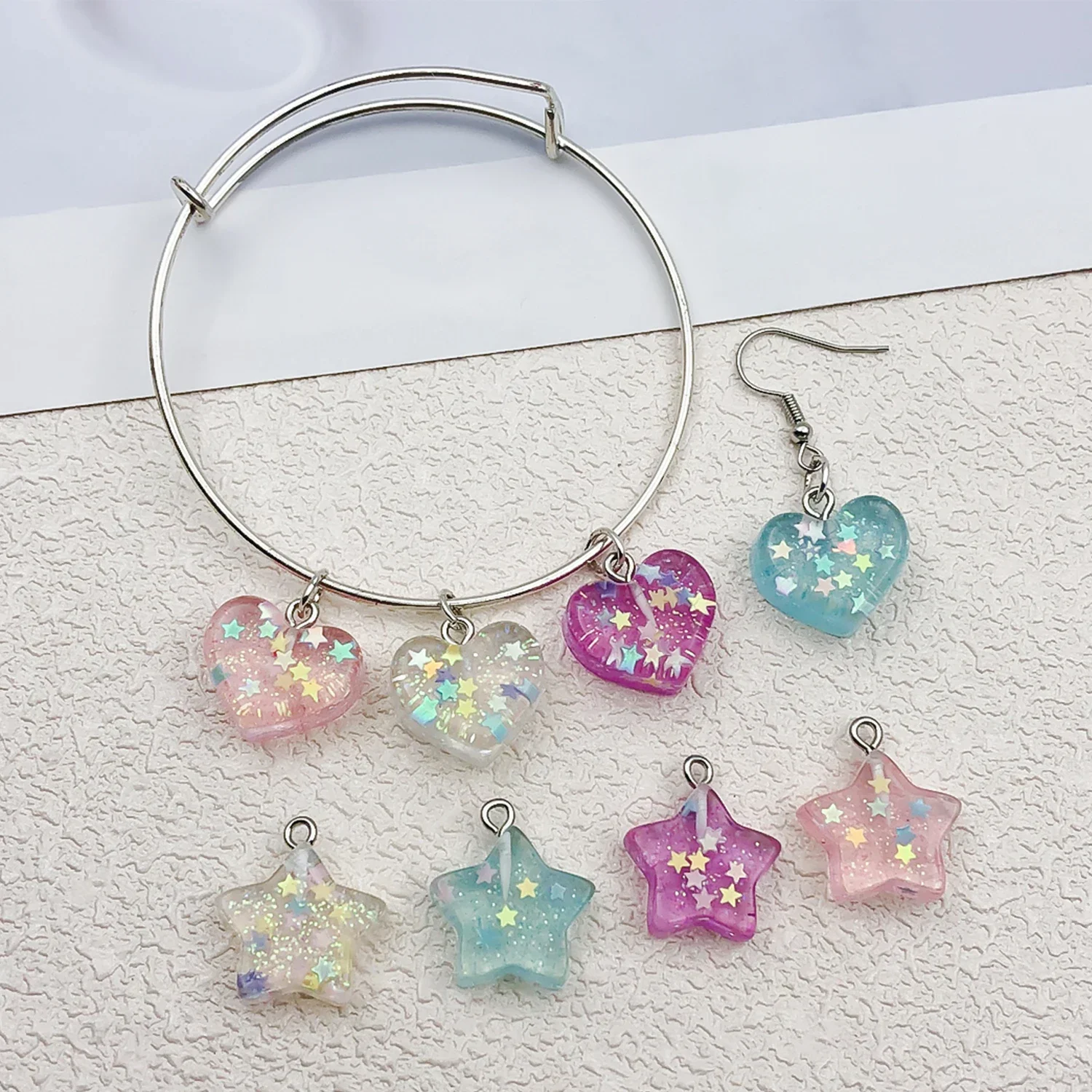 7pcs Resin Simulated Transparent Glitter Sequins Small Hearts and Stars Earring Keychain Charms DIY Accessories.