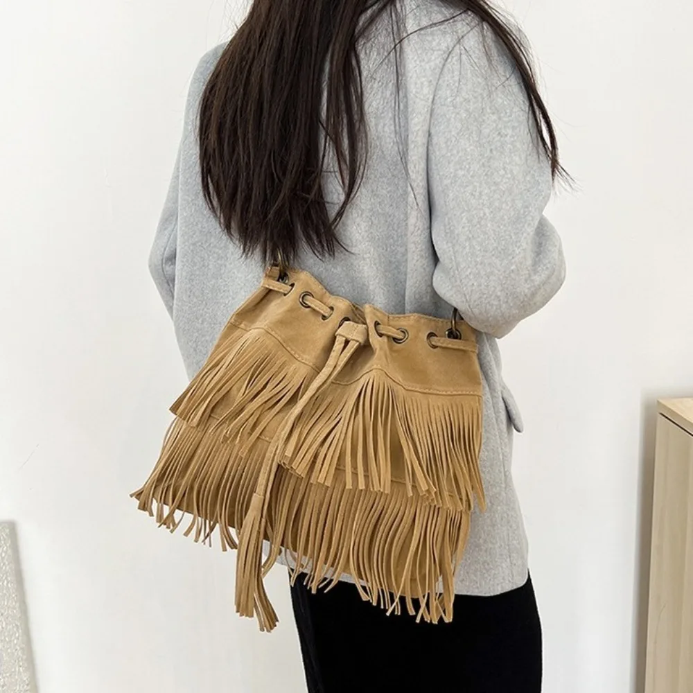 

Korean Style Tassel Shoulder Bag PU Leather Solid Color Suede Handbag Ethnic Style Large Capacity Drawstring Bucket Bag Women
