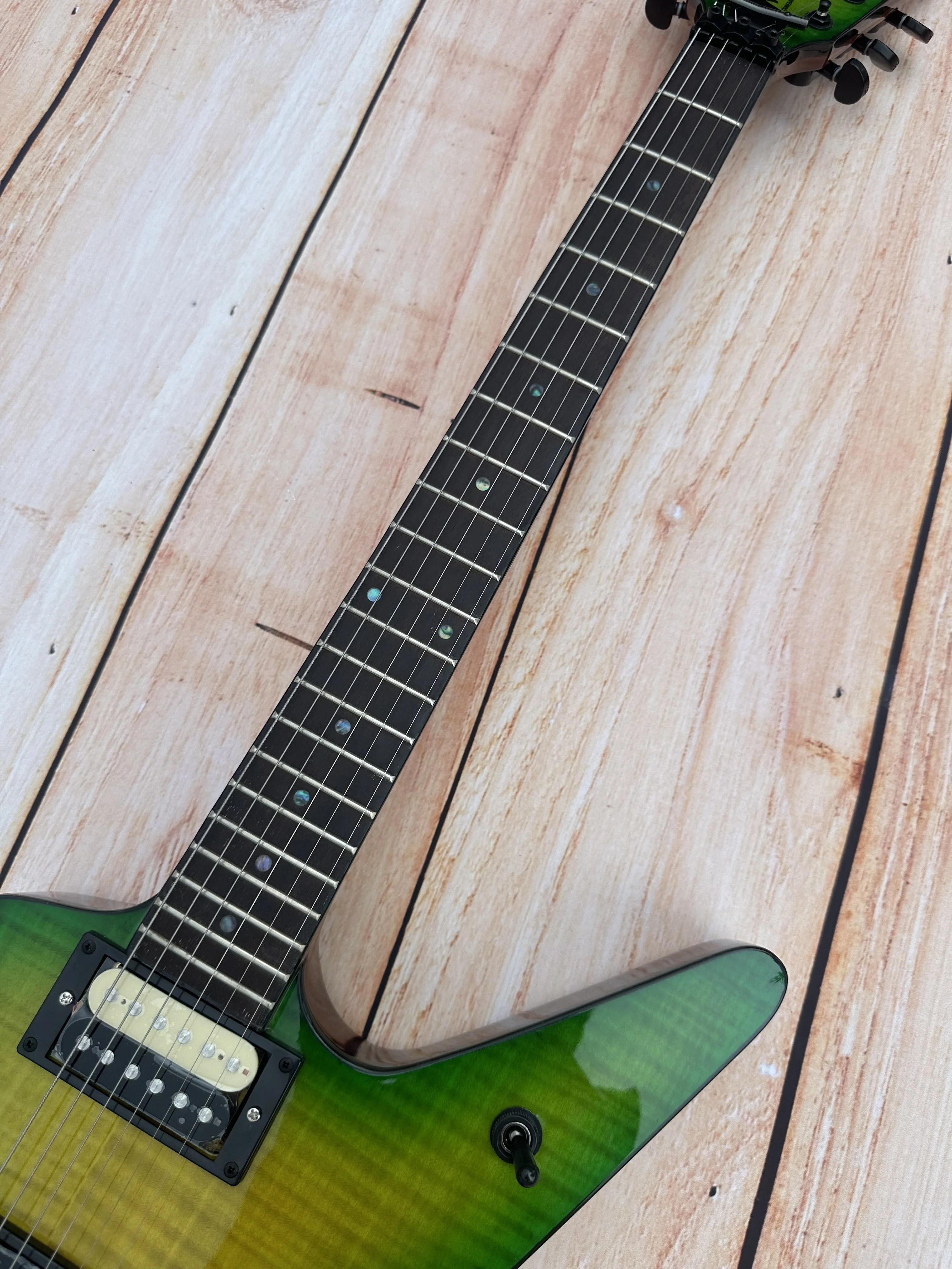 Irregular electric guitar, black double shake, imported wood and paint, green tiger pattern, bright light, in stock, fast shippi