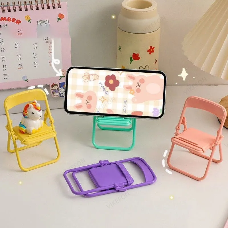 

Foldable Mini Phone Holder Desktop Lazy Cellphone Mount Ornament Small Doll Display Stand for iPhone Smartphone Drama Partner