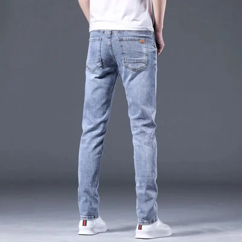 Jeans Denim ramping pria, pakaian mewah kelas atas untuk pria musim gugur 2024 baru Skinny Korea Solid biru muda celana Golf Streetwear