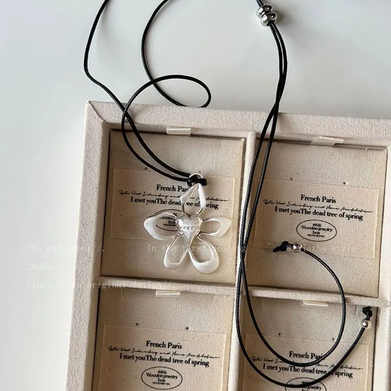 Hollow flower necklace women's summer black rope drawstring adjustable accessory temperament long chain