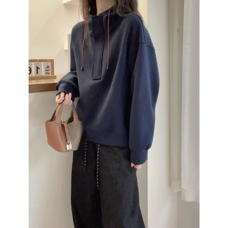 Koreańska wiosenno-jesienna bluza z kapturem w jednolitym kolorze, luźna, damska, codzienna i uniwersalna bluza wkładana przez głowę z długim rękawem.