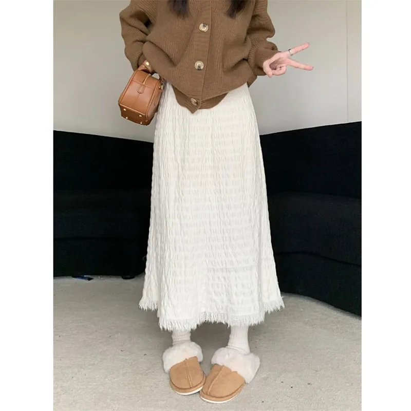 Vintage gebreide rokken voor dames mode streetwear hoog getailleerde ruwe rand a-lijn rokken vrouw veelzijdige losse effen lange rok