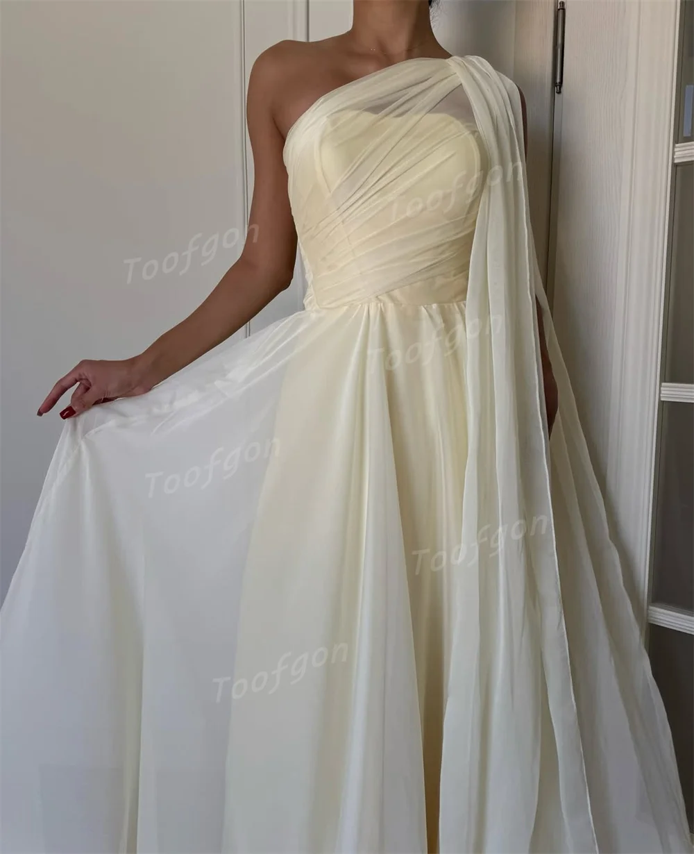 ชุดราตรีผู้หญิงสีเหลืองแบบไหล่เดียว ผ้าชีฟอง ดีไซน์หรูหรา จับจีบ สำหรับงานเลี้ยงอย่างเป็นทางการ ชุดราตรียาวสั่งตัดได้ สไตล์ซาอุดิอาระเบีย