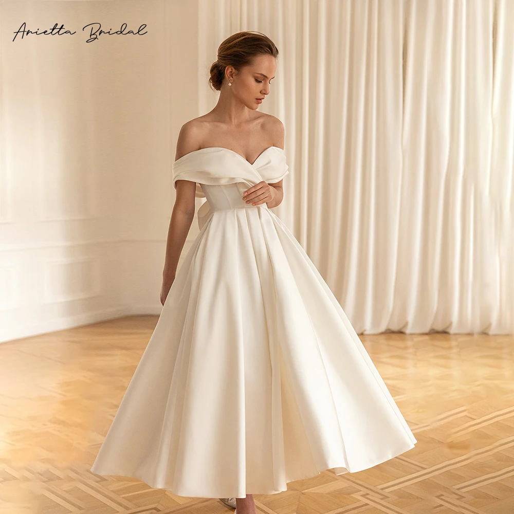 

Arietta Simple Short Satin Wedding Dresses Off the Shoulder Tea-Length A-Line Bride Dresses Bow Back Modern Bridal Gowns 2024