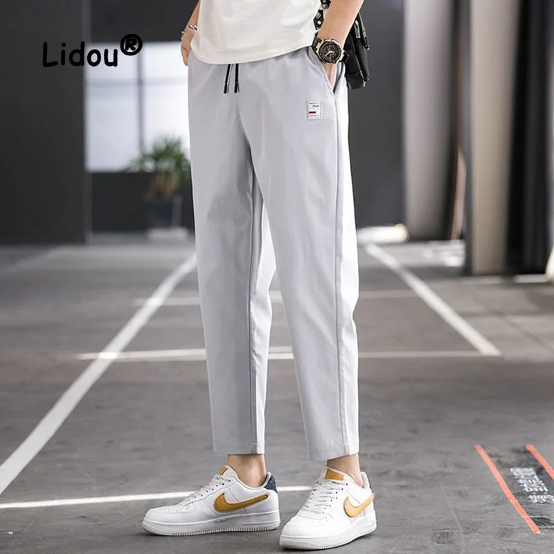 

Handsome Fashion Stickers Loose Casual Ninth Pants Man New Classic Korean Tide Waist Drawcord Male Wide Leg Trousers Thin 2023