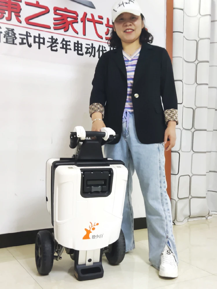 Folding the elderly three-wheeled electric scooter suitcase type lightweight carrying elderly power tram