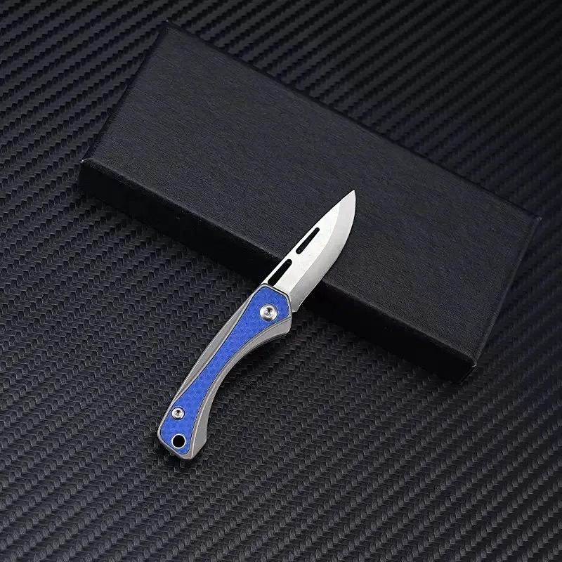 Nuovo mini coltello pieghevole portatile D2 Lama in lega di titanio Maniglia Tasca Sopravvivenza Tattica di caccia Utilità Coltelli da frutta Strumento EDC