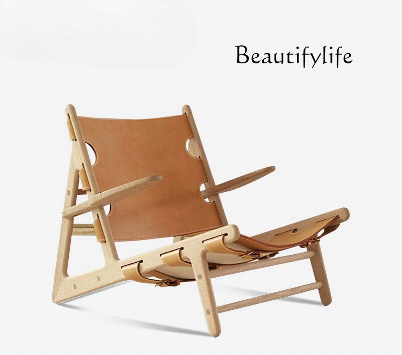 

Nordic solid wood sofa chair single designer living room balcony wabi wind saddle leather leisure lounge chair