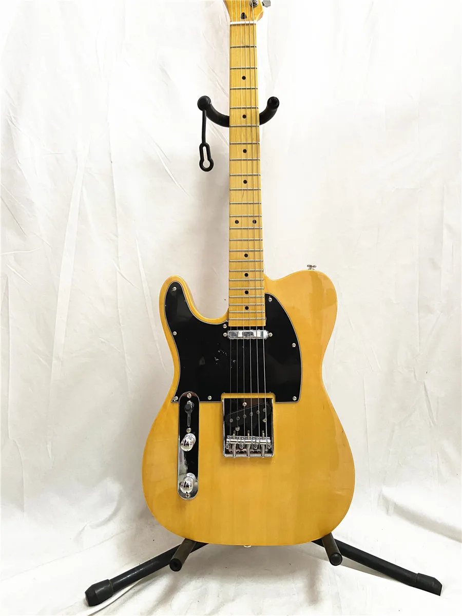 Custom left hand light yellow 6 string electric guitar maple neck black guard plate can be customized free shipping