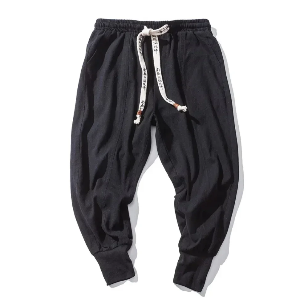 Pantaloni stile harem in cotone e lino da uomo tinta unita elastico in vita streetwear pantaloni 2024 nuovi pantaloni larghi con cavallo basso pantaloni casual da uomo