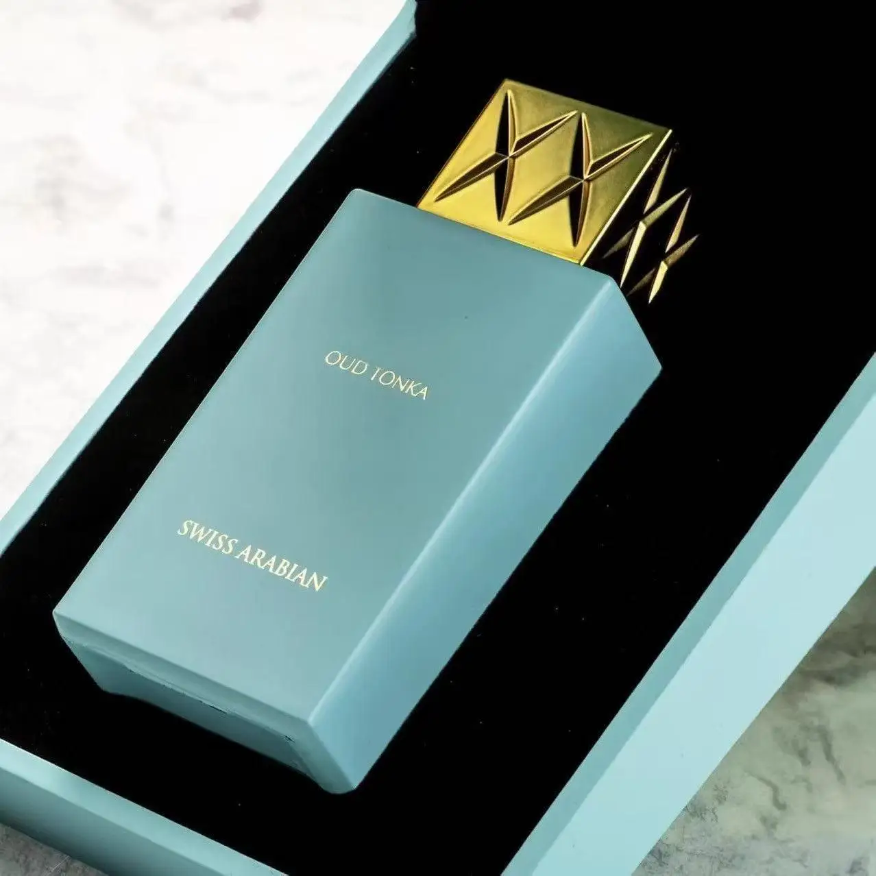 Swiss Arabian Oud Tonka Fragrance: Premium Turquoise Bottle, Long-Lasting Aroma for All Occasions