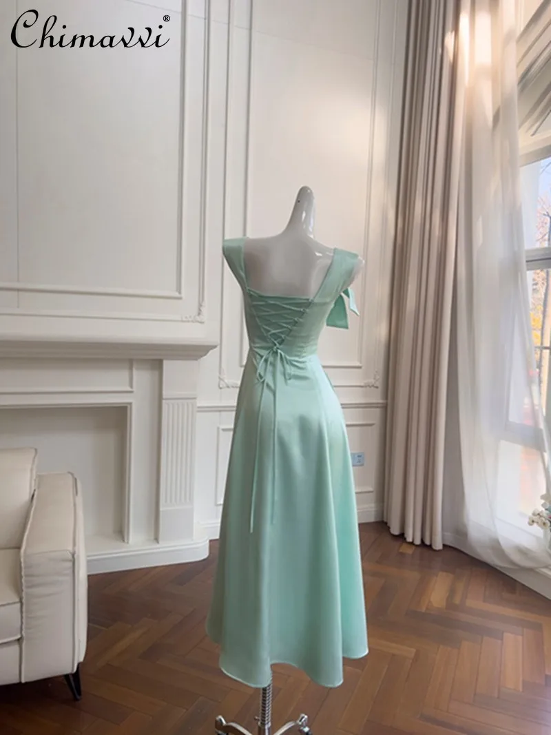 2026 lente en zomer nieuwe high-end vierkante hals strik taille satijnen jurk damesmode stropdas elegante lange feestjurk jurken