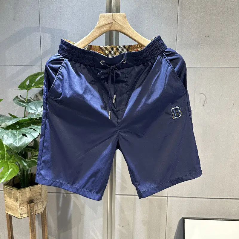 Summer embroidered men's shorts trend quick-drying five-point casual pants fashion versatile breathable beach pants