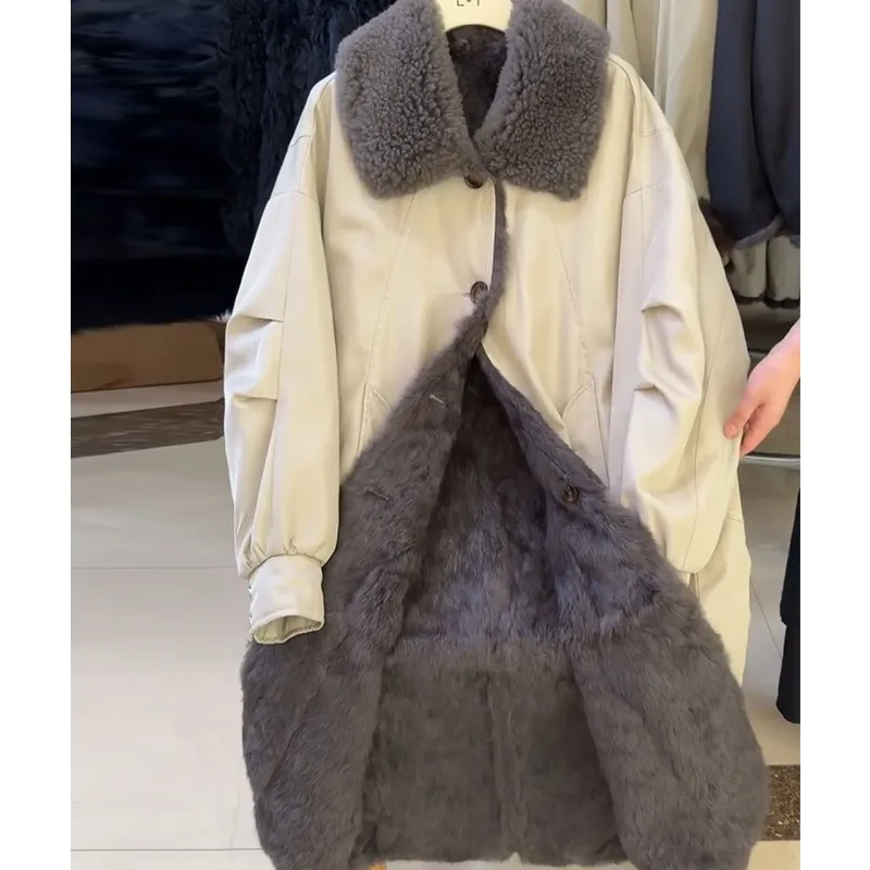 Le style de doublure intérieure chaude et à la mode de MAO MAO est un nouveau manteau en fausse fourrure ample mi-long haut de gamme pour les femmes en vêtements d'extérieur d'hiver