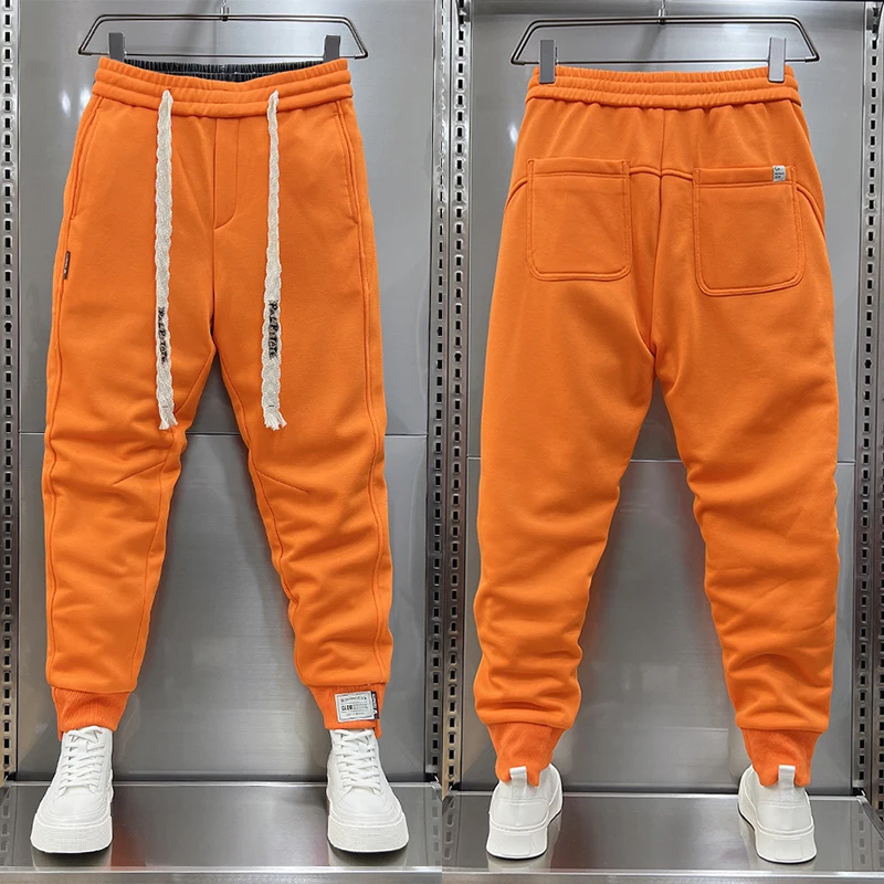 Pantalones deportivos naranjas de otoño para hombre, pantalones deportivos coreanos de calle alta, pantalones de chándal de algodón de 9 minutos, ropa de moda para hombre 2025