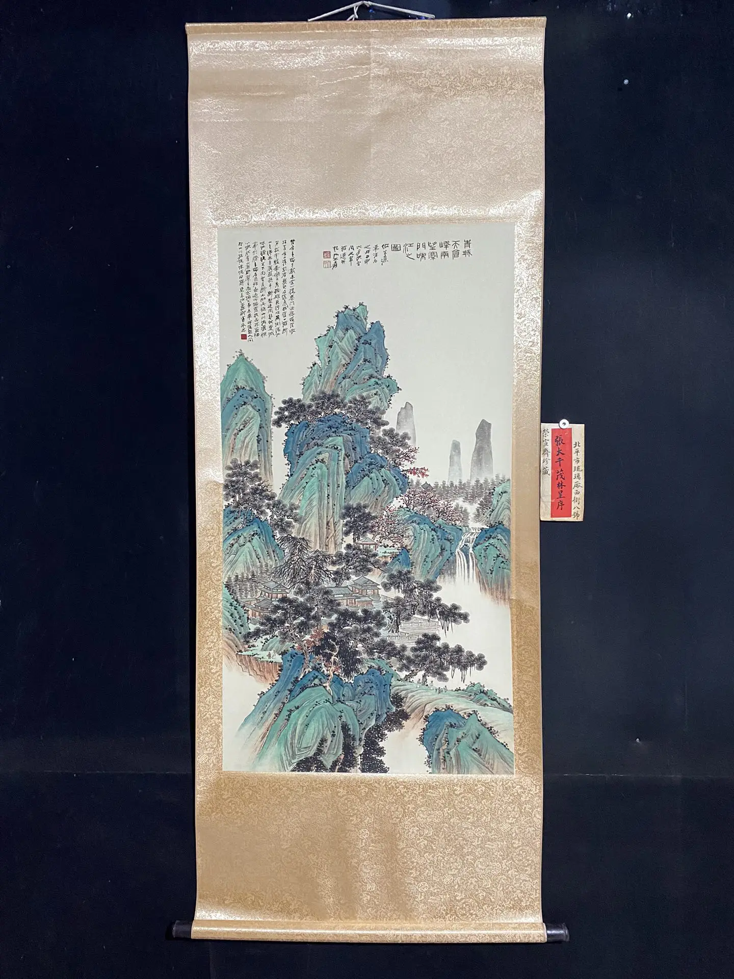 

A high-quality four-foot vertical scroll painting featuring a letter by Zhang Daqian, depicting landscapes (dense forests and or