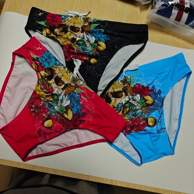 

2026 Combination Printed swimming trunks men's sports beach swimsuit punk personality European and American men's briefs 10003