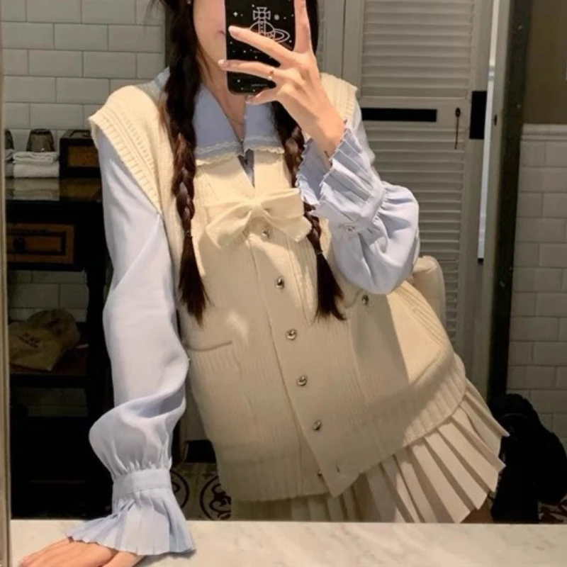 2025 Новый японский корейский консервативный комплект Kawaii с узлом-бабочкой, вязаный жилет, рубашка, женская зимняя мини-юбка с высокой талией, комплекты из трех предметов