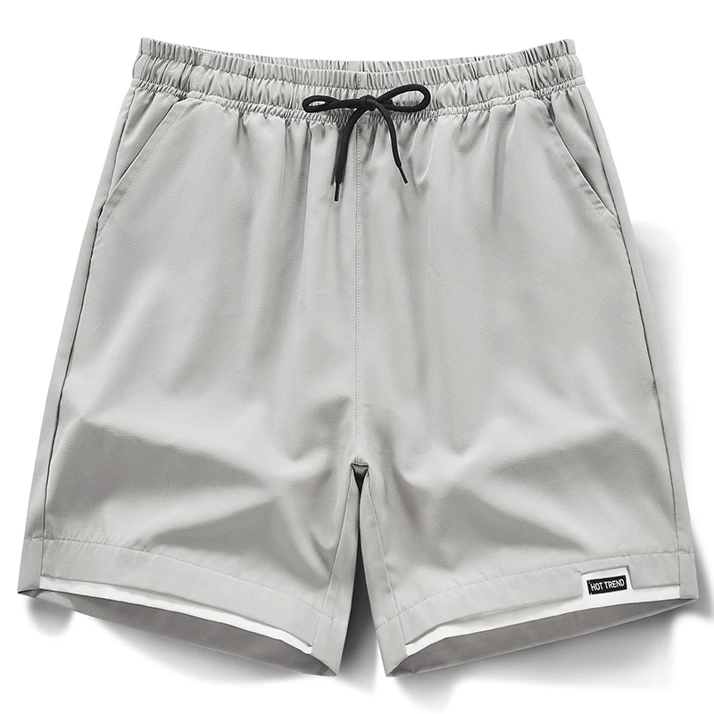Fashion Solid Color Spliced Fake Two Pieces Casual Shorts Men's Clothing 2024 Summer New Loose High Waist Elastic Knee Shorts