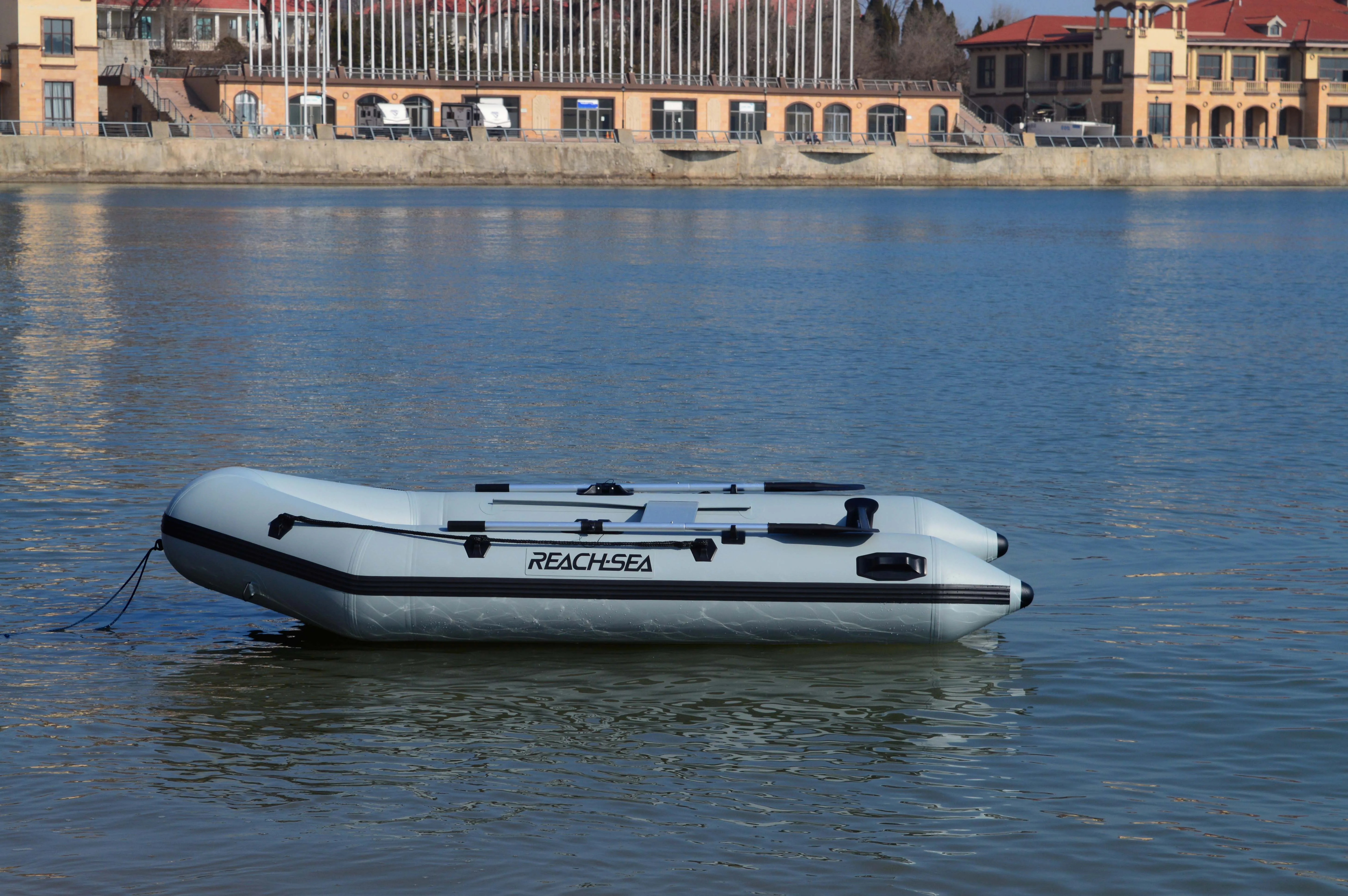 Reach-Sea, venta al por mayor, barco de pesca inflable de goma de Pvc personalizado, ligero, barato, con remos de aluminio