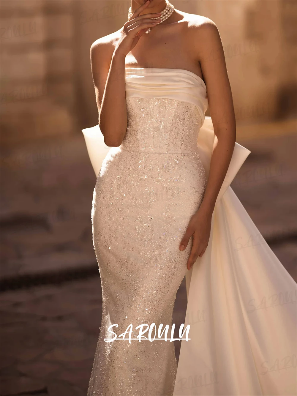 Abito da sposa da donna lucido senza spalline con strascico a fiocco Abiti da sposa lunghi a sirena affascinante Abito da sposa di lusso personalizzato