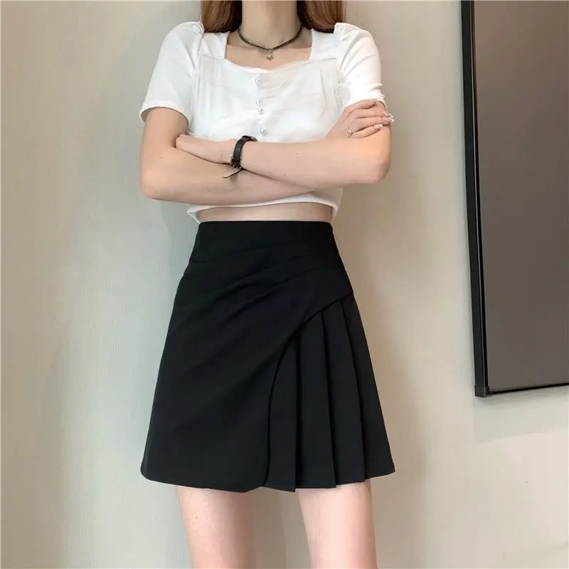 Fashion Zipper Solid Color Asymmetrical Pleated Short Skirts Women\'s Clothing 2024 Summer New Loose All-match Irregular Skirts