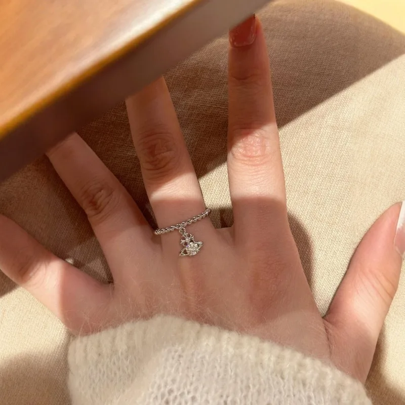 Pequeñas cuentas redondas de Saturno, anillo ligero de lujo con cuerda de diamante para primavera, anillo de goteo con sensación de planeta, diseño de nicho a la moda