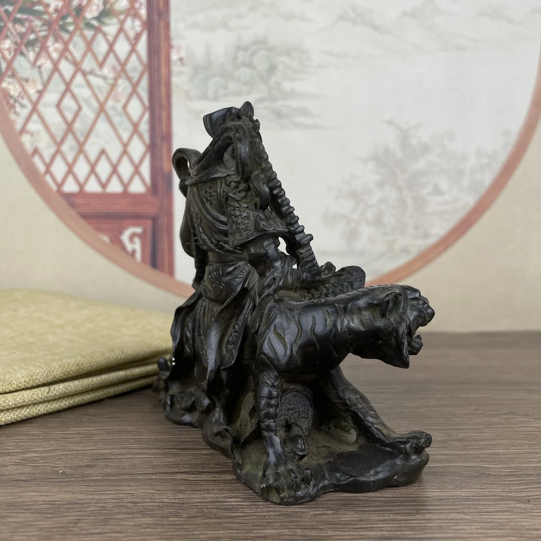 The metal statue of Zhao Gongming, the God of Wealth, measures approximately 12cm in length, 6cm in width, 11cm in height, and w