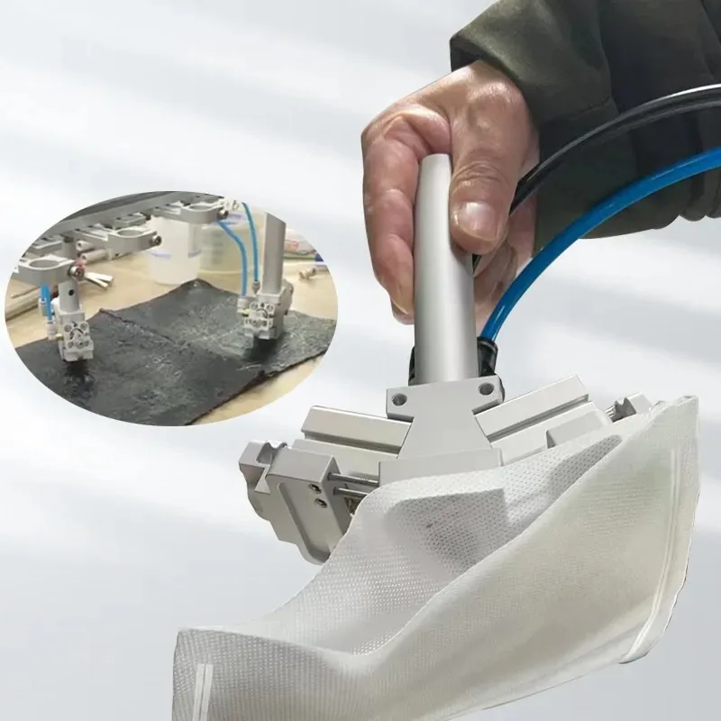 Mechanical arm pneumatic needle clamp disassembly fixture suitable for sponge non-woven fabric