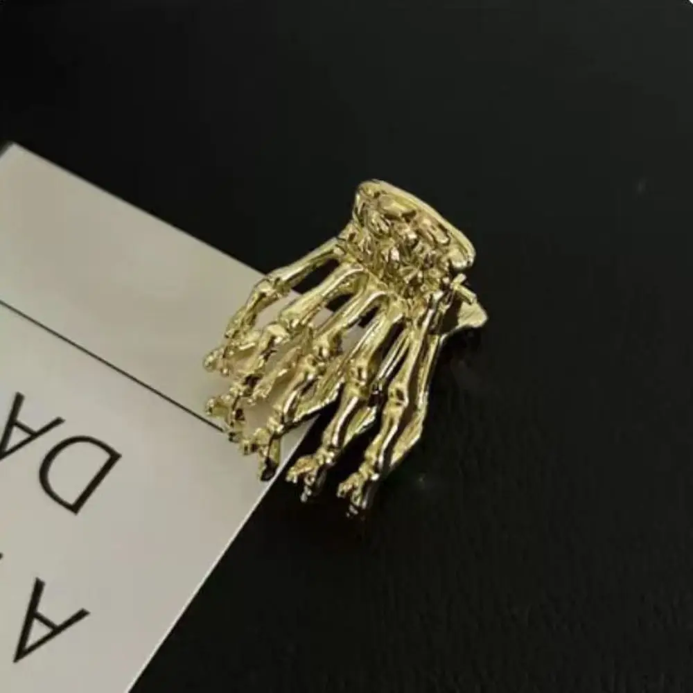 

Zinc Alloy Skeleton Hand Hair Claw Skeleton Hand Bone Hollow Small Shark Clip Korean Style Geometric Metal Hair Claw Girl
