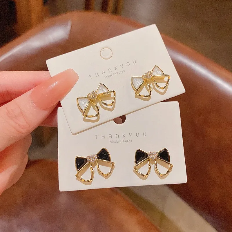 925 Silver Needle Korean Fashion Drip Oil Bowknot Earrings For Women Jewelry 2026 Trending New Drip Oil Bow Earrings A316