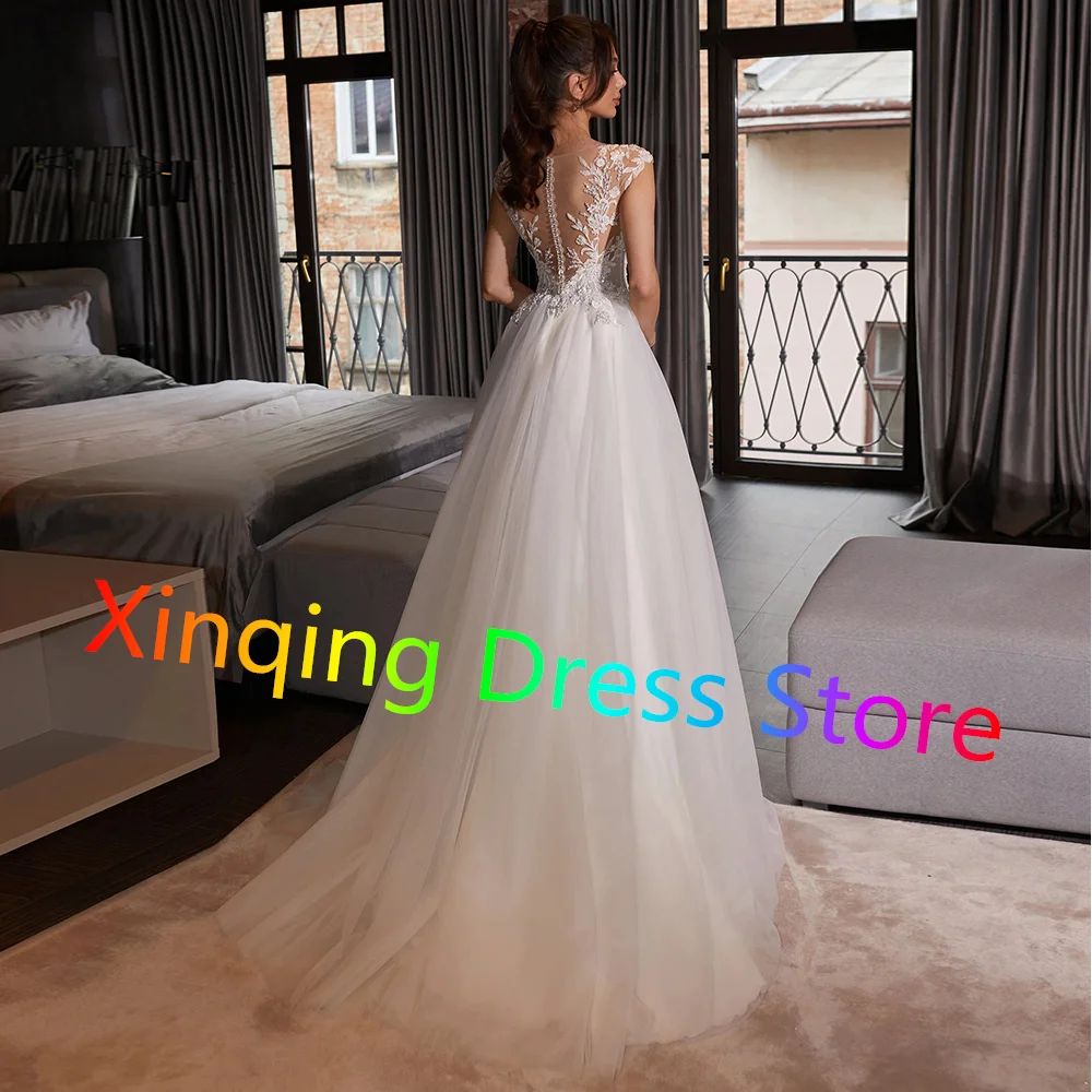 Charming Appliques Tulle Wedding Dress Ladies Sweep Train Cap Sleeves O-neck Bridal Gowns Button Back with Pearls Custom Made